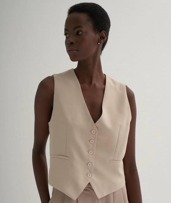 კრემისფერი ჟილეტი